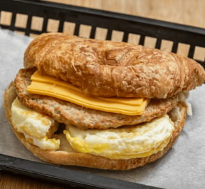 Ham Sausage Egg & Cheese Croissant Sandwich